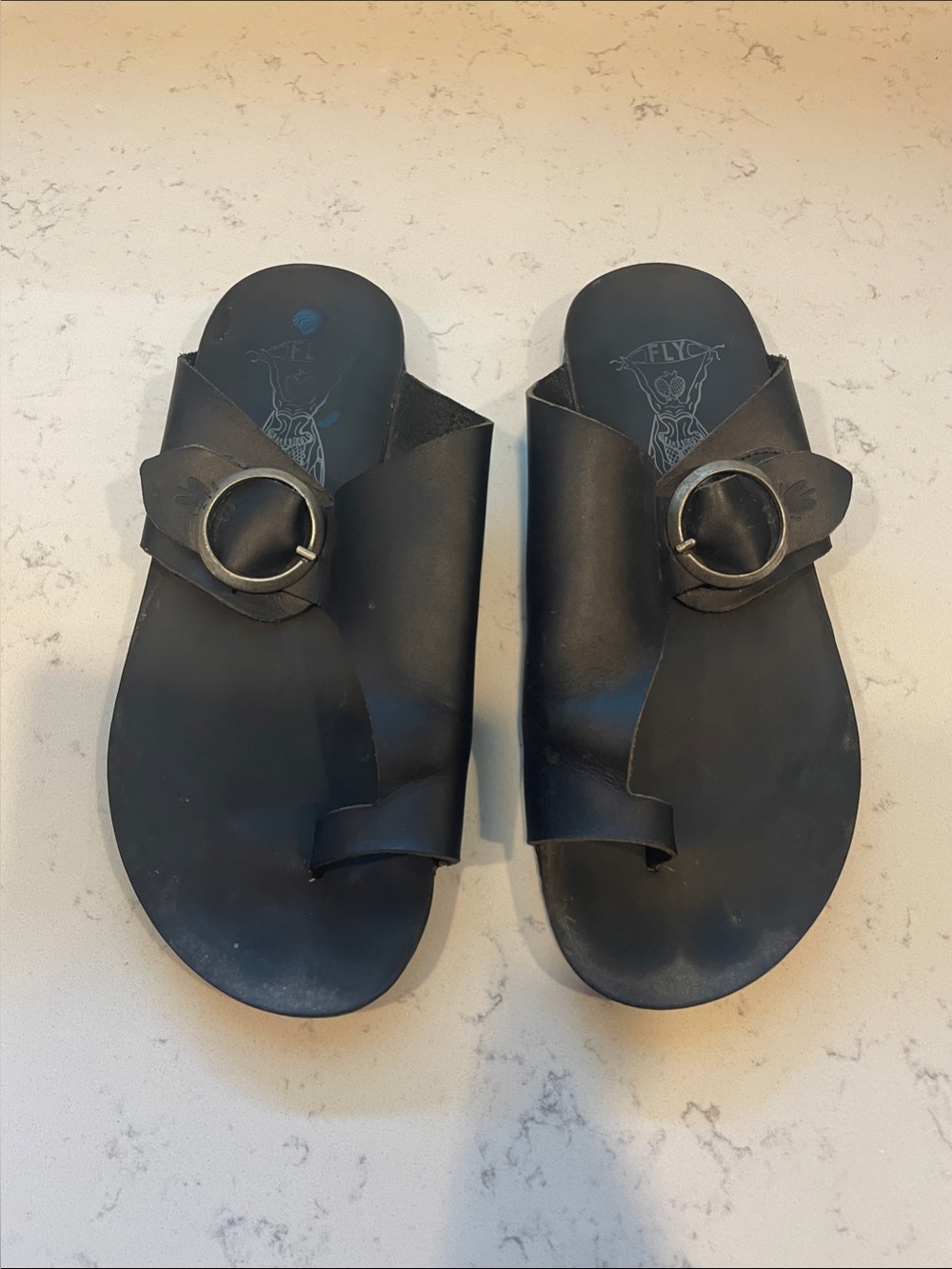 Fly London Black Leather Slide Sandals with Round Metal Buckles